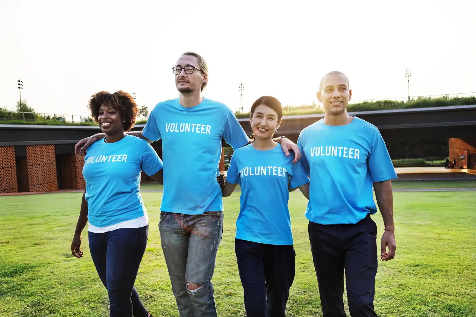 Group of volunteers walking together at a charity fundraising event